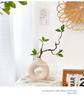 Green Plants Ceramic Vase with Hanging Bells and Artificial Flowers - Home Decoration Props