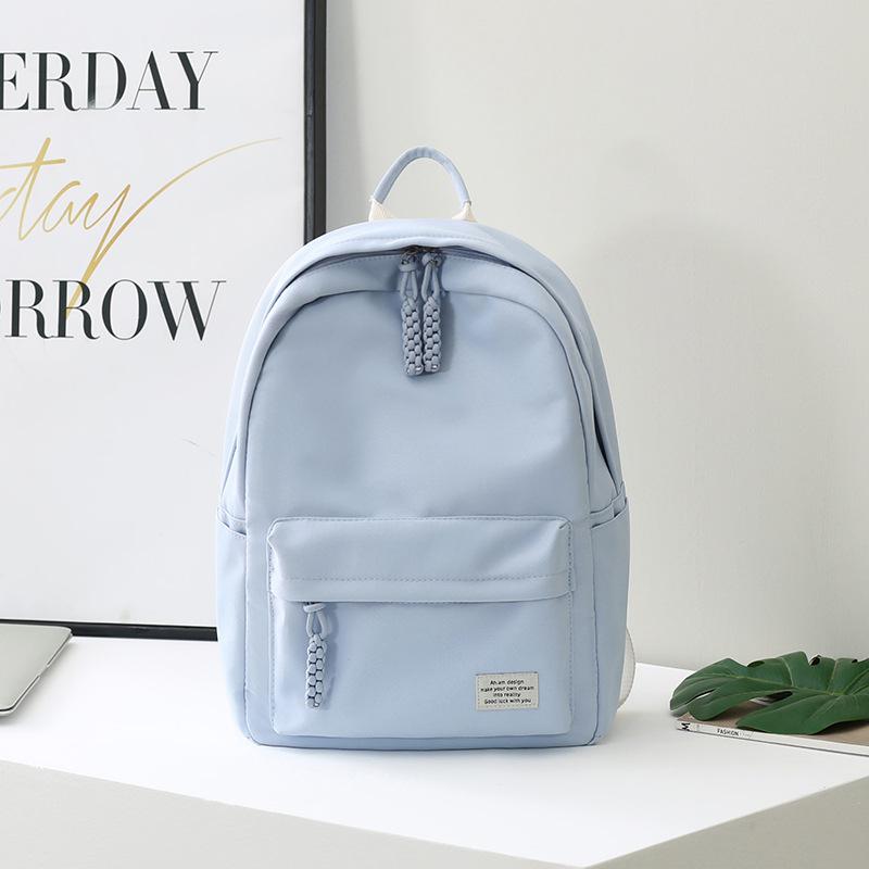 Solid color class schoolbag female college student junior high school student high school student backpack new simple travel backpack customization