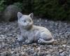 Decorative garden sculpture of a cat made of concrete