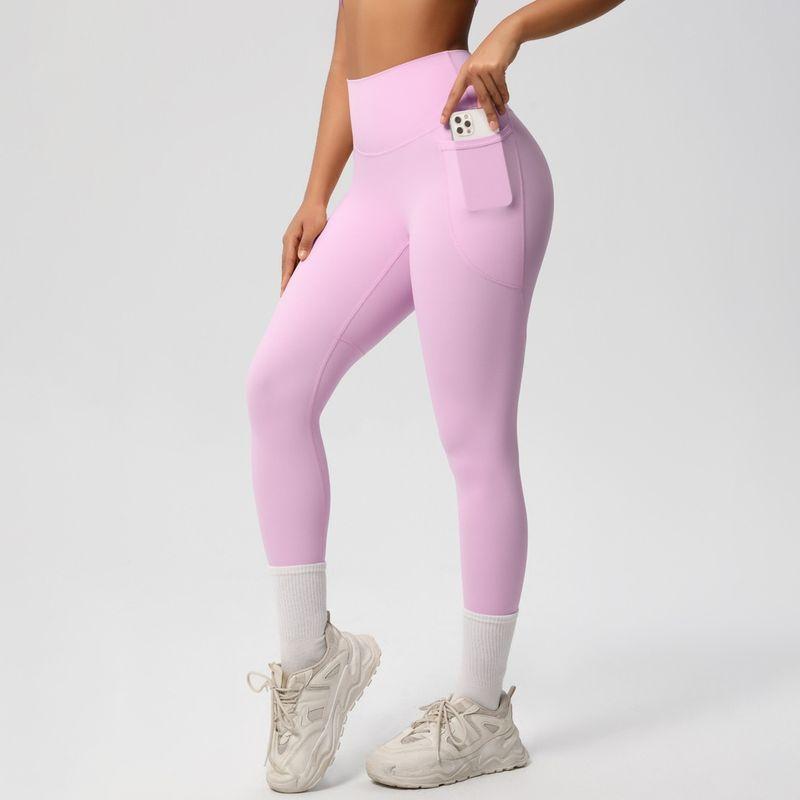 Fashion Nude Feel Beauty Back Cross Bubble Wrap Sports Bra High Waist Hip Lift Pocket Sports Yoga Pants Fitness Suit Women