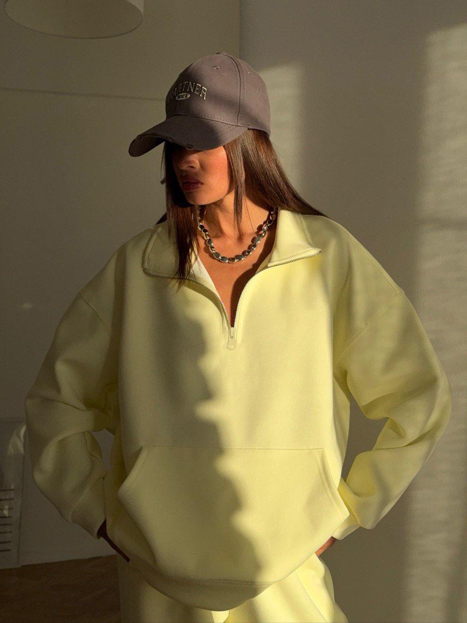 

Жіночий світло-жовтий повсякденний костюм-худі на шнурках та штани-джоггери Вуличний стиль Комплект з двох предметів XL жовтий