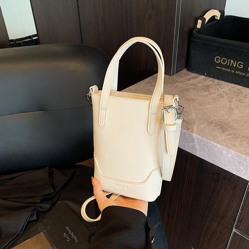 

Niche hand carrying bucket bag women s new high-end fashion shoulder messenger bag mobile phone bag