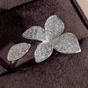 Cao Shi European-American Copper Zircon Flower Ring: Luxurious and Exquisite Open Design Jewelry for Women