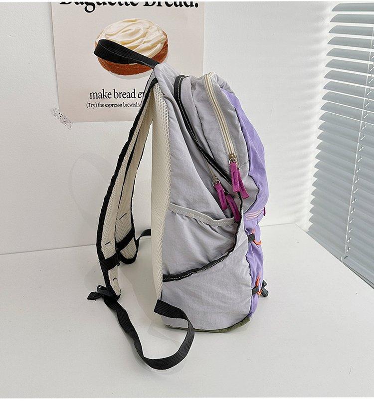 Schoolbag travel easily, a backpack, full of trendy fashion nylon zipper contrasting colors