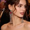 Elegant Retro Tassel Dangle Earrings: Exotic, Artistic, Classic, and Exquisitely Hollowed for a Dignified Look.