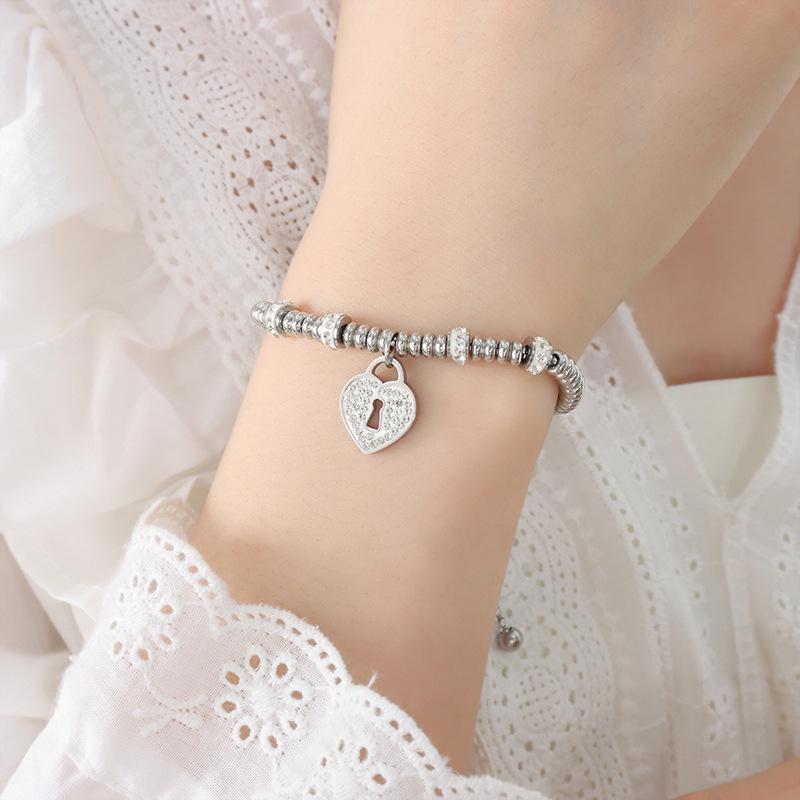 Women's Cute Japanese-Korean Fashion Bracelet: Hollow Heart Pendant, Round Bead, Real Gold Titanium Steel Jewelry