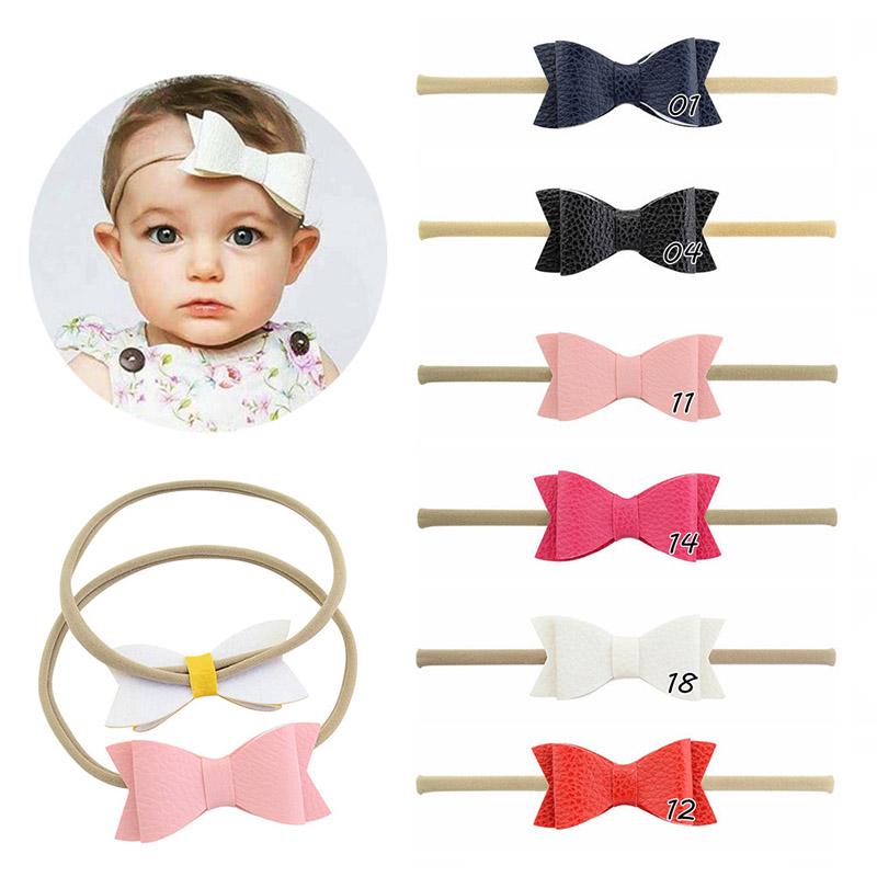 

Кожа Bowknot Baby Оголовье Эластичный нейлон Дети Девочка Баны Тюрбан Детские повязки для волос Аксессуары для волос