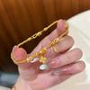 Gold-Plated Four-Leaf Clover Water Drop Bead Bracelet for Women - Long-Lasting, High-End Imitation Gold Jewelry.