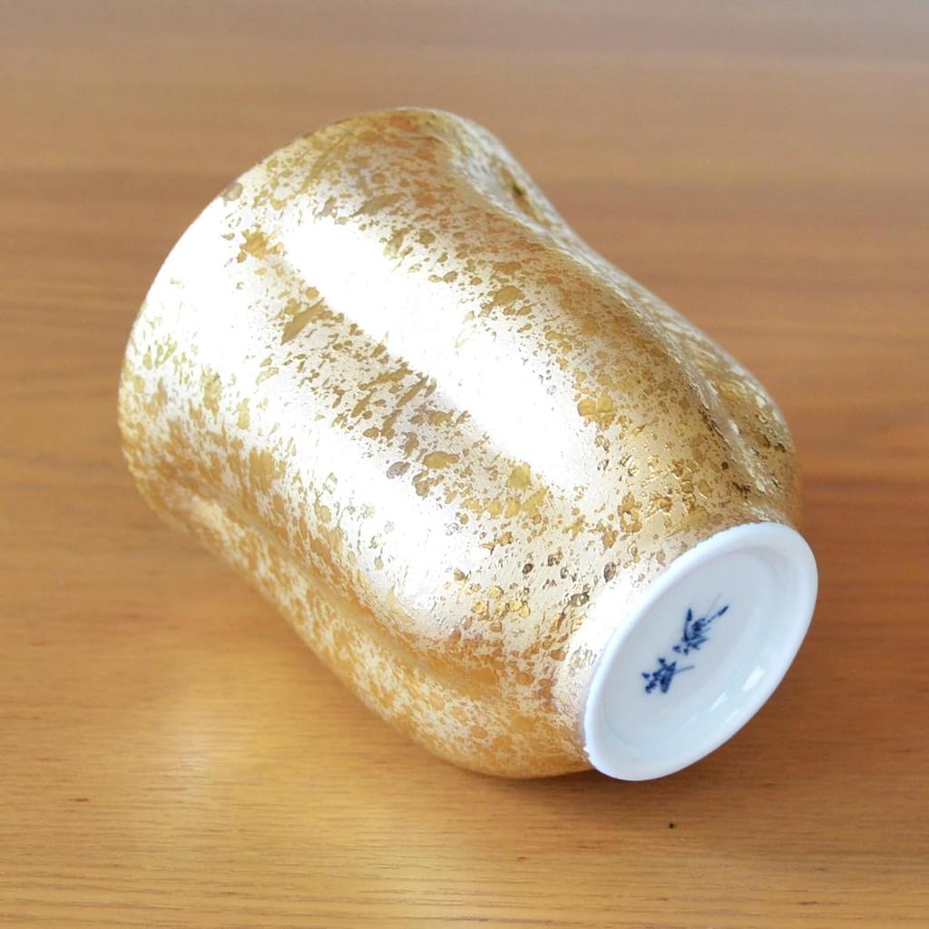 A perfect gift for celebrating a 100th birthday or 100th This Arita ware shaped like a cherry blossom features gold accents and comes with a message