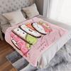 Kawaii Sushi Characters Blanket - A whimsical cartoon illustration of smiling sushi (tuna nigiri, salmon, avocado, pink fish) on