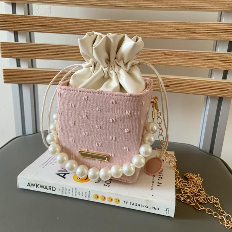 New niche bucket bag trendy personalized high-end messenger bag simple atmosphere pearl portable women's bag