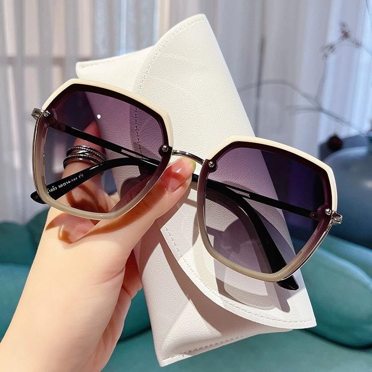 New sunglasses women's temperament sunglasses black gold gradual change color sunglasses advanced anti-ultraviolet explosion