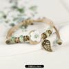 Retro ceramic flower woven bracelet niche literary hand rope small fresh bell bracelet female