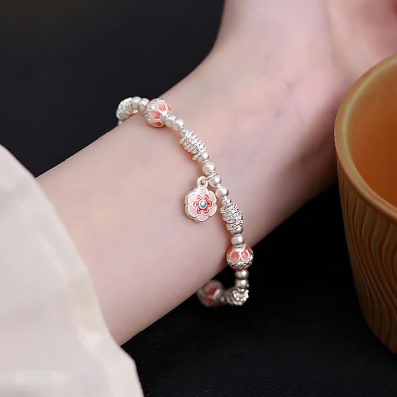 Enamel color Baoxiang flower bracelet, lucky character flower ball entanglement bracelet, light luxury high-end bracelet, fashionable and versatile