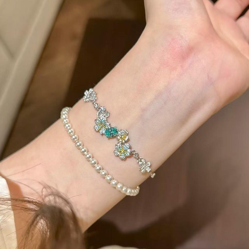 2026 Light Luxury Premium Brushed Flower Bracelet Retro Flash Diamond Paraiba Retractable Bracelet Women