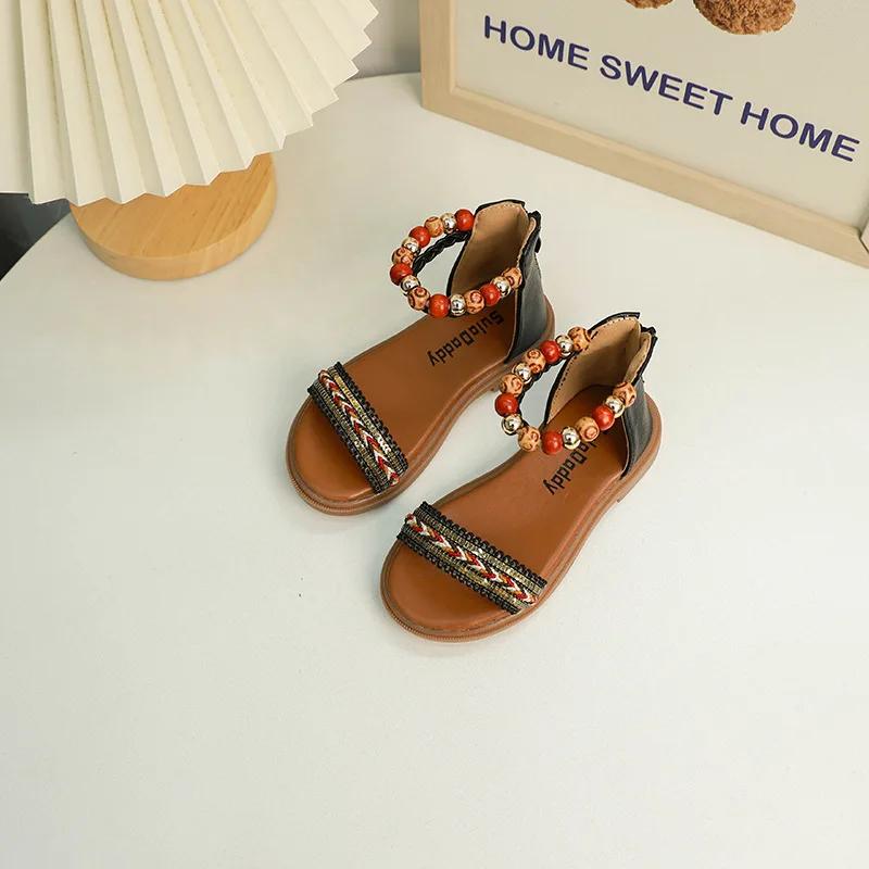 

Летние детские сандалии для девочек в богемном этническом стиле, принцесса, повседневные римские сандалии с бисером, модные детские пляжные сандалии с открытым носком 23 чёрный