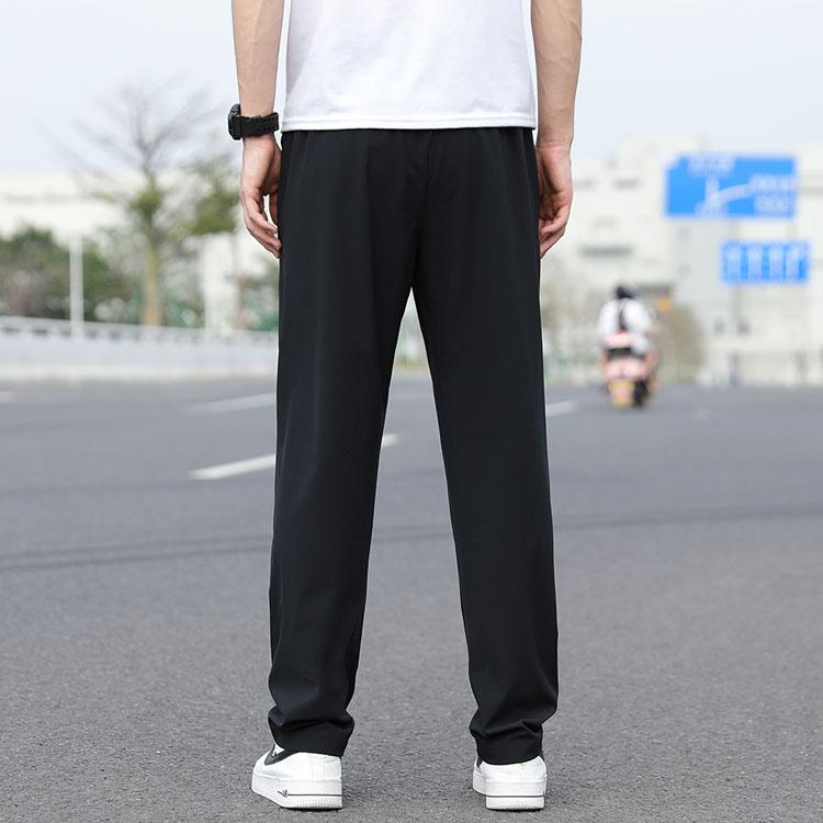 Li Ning Football Series Solid Color Ice Silk Lightweight Breathable Stretch Knitted Sports Pants Men Pants Black AYKS473-1