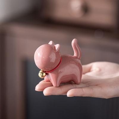 A Small Chinese-style Cute Cat Tea Pet Figurine with a Ceramic Cat Brush Stand