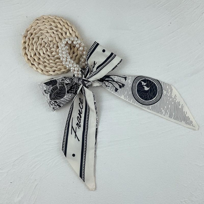 Panglică cu perle pentru păr – accesoriu elegant și elastic