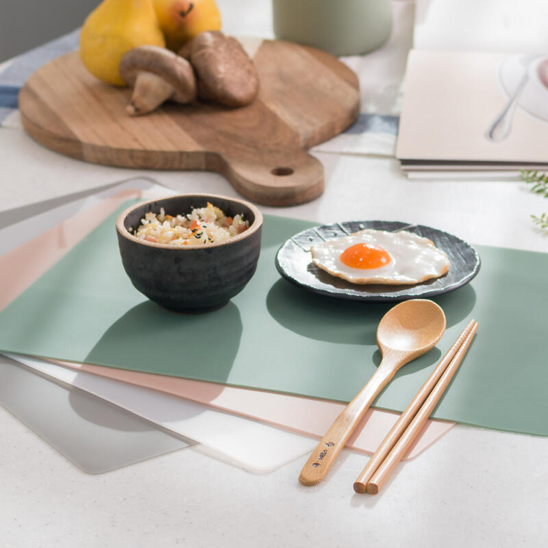 Two types of domestically produced silicone kitchen table mats Lace placemat pink beige