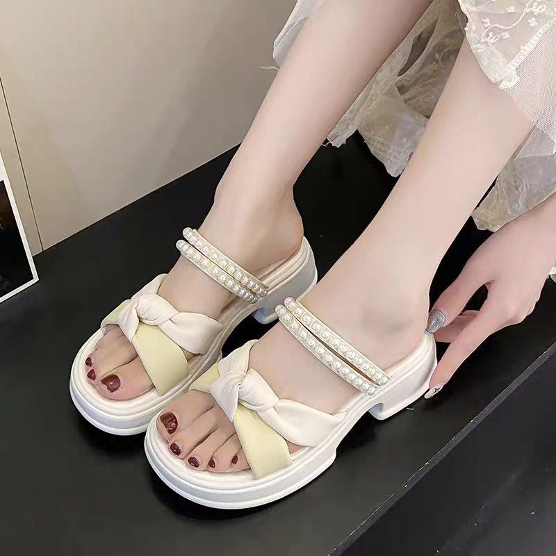 

2025 new platform outer wear one word two wear open-toed fairy wind beach shoes pearl thick heel cool slippers female summer 40