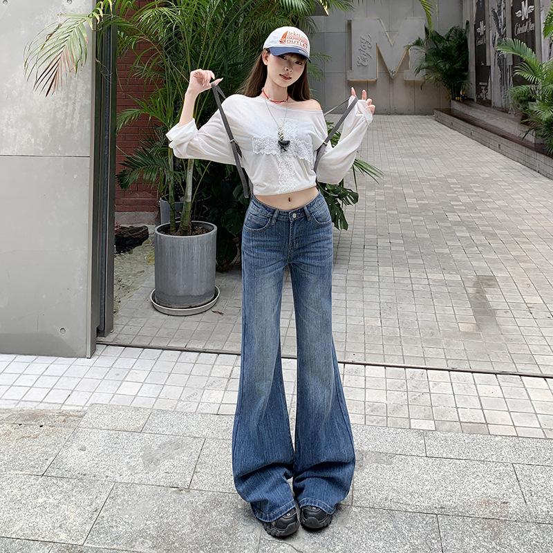 Retro blue low-rise slightly pulled jeans women's year autumn and winter new slim-fitting wide-leg slim-looking flared pants without sticking to the