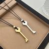 Elegant Metal Key Charm Black Rope Necklace Stylish Layering Pieces For Everyday Wear