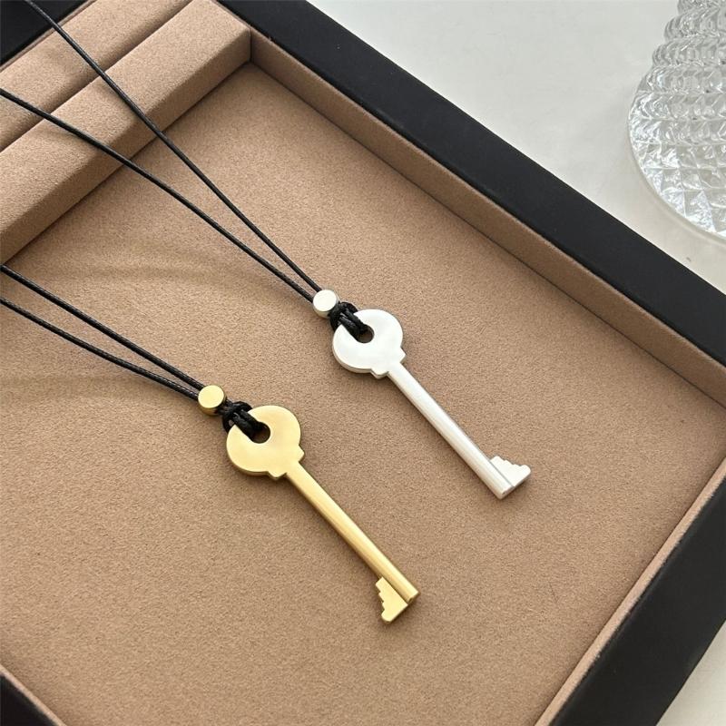 Elegant Metal Key Charm Black Rope Necklace Stylish Layering Pieces For Everyday Wear