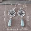 Bohemian Retro Alloy Pendant Earrings with Inlaid Turquoise and Artistic Carvings