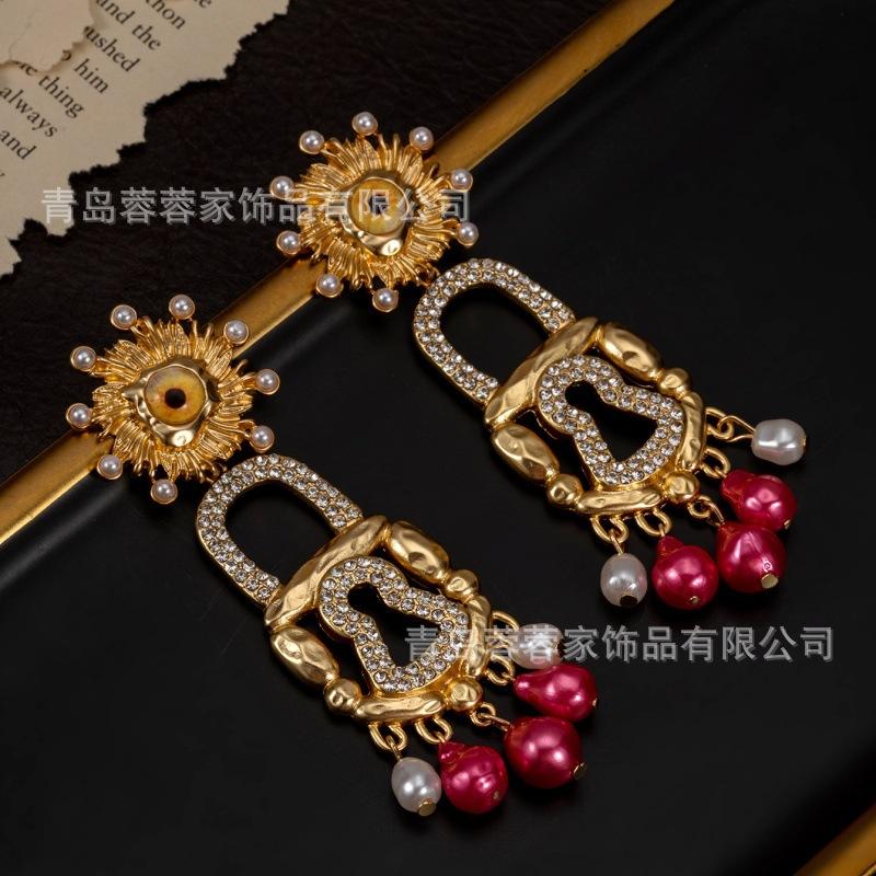 Middle Aged High-end Earrings Xiapa Runway Style Sun Eye Lock Pearl Exaggerated Personality Feel