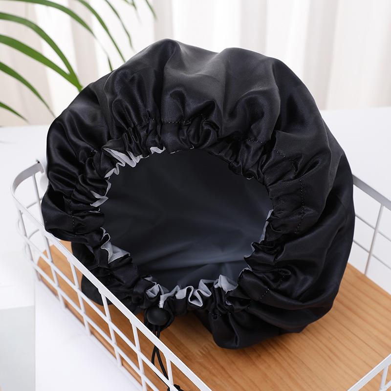 

Двухслойная шапочка для душа большого размера с регулируемой кулиской, из водонепроницаемого черного сатина + материала PEVA чёрный