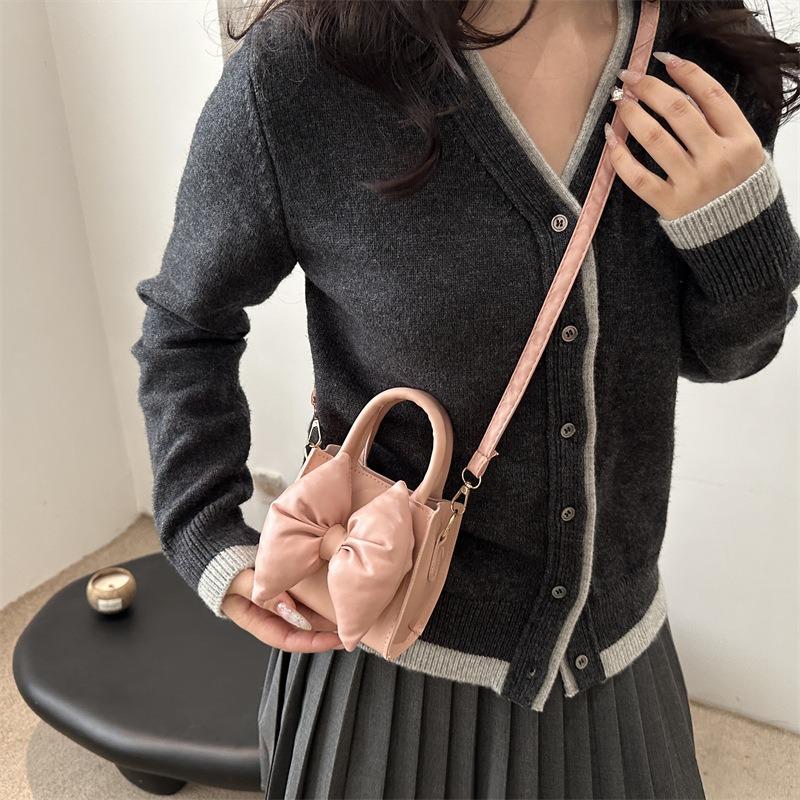 Niche bow solid color new mini hand carry small square bag summer beautiful retro shoulder messenger bag women