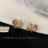 Bow winding love pink zircon light luxury high-end stud earrings small exquisite ear clips women's earless earrings
