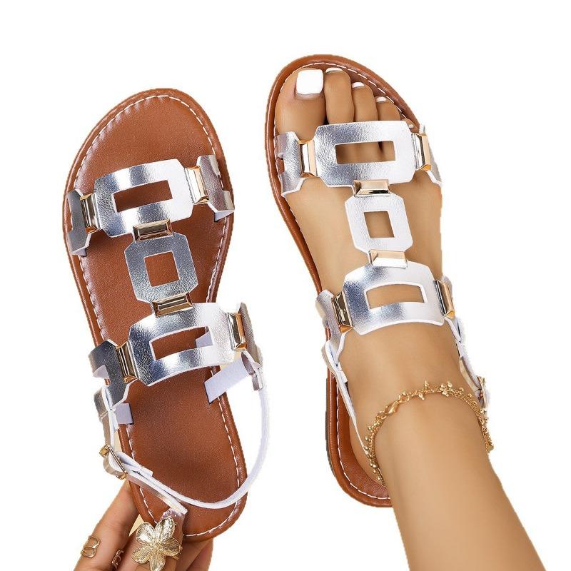 Women's shoes belt buckle flat-bottomed hollow sandals women's fashion versatile outer wear solid color beach sandals