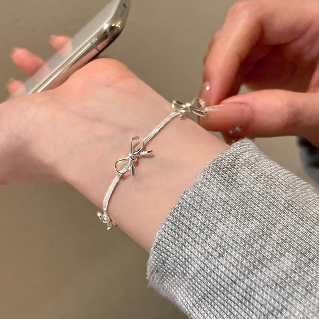 Bracelet minimaliste en argent avec nœud en os de serpent pour femme, bijou de niche haut de gamme, style vent froid