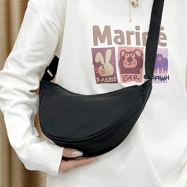 

Women s bag, four seasons nylon dumpling bag, female student summer 2025 new fashion casual messenger bag 10 inches