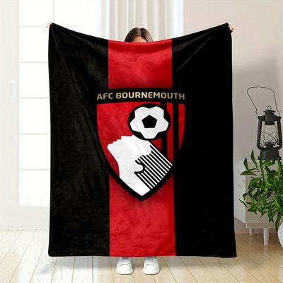 A Shield with a Soccer Player Heading a Ball and Vertical Red Stripes. for All Seasons Blanket Lunch Break Throw Gift