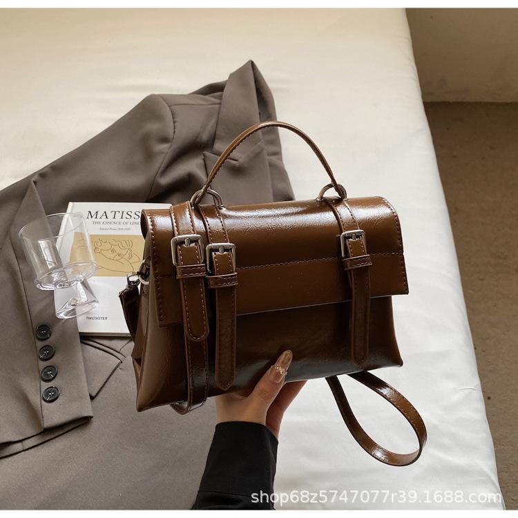 Retro preppy style large-capacity handbag women's 2025 pre-spring new Korean solid color shoulder bag textured messenger bag