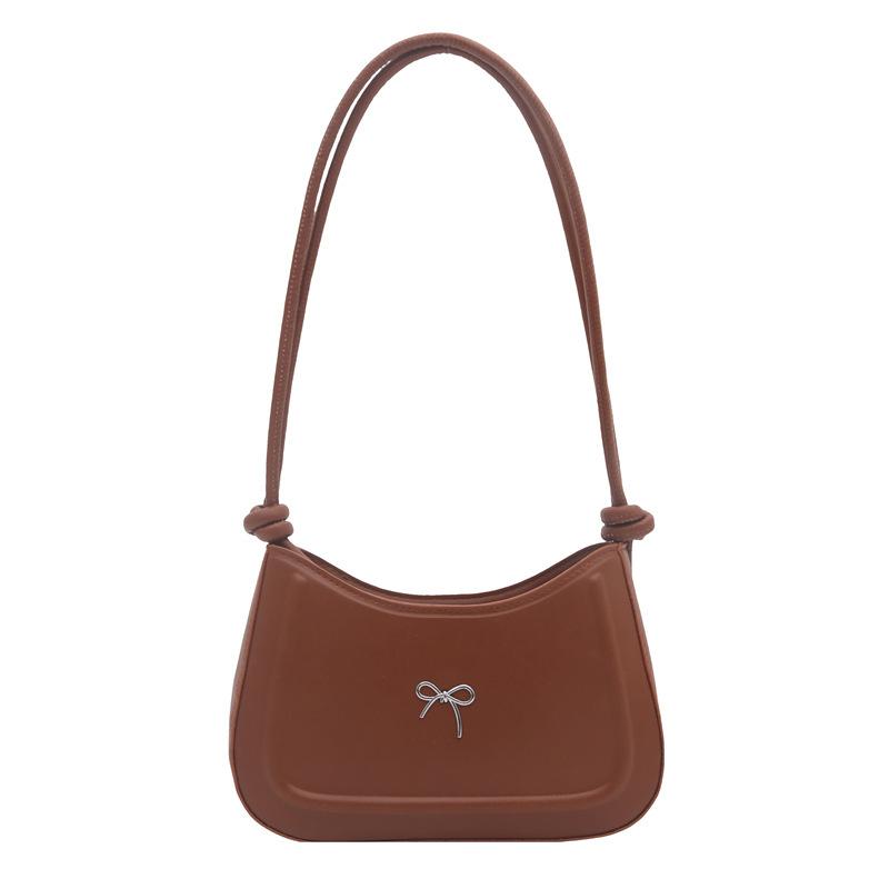 Simple pressure shell autumn temperament bow decorative design texture large capacity casual axillary shoulder women's bag