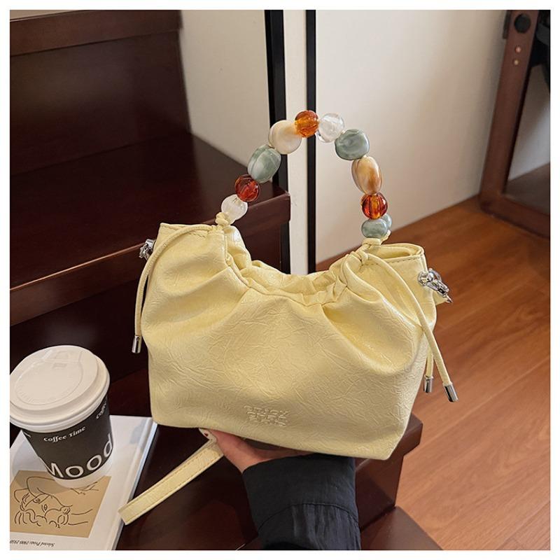 Pleated high-end fashion versatile new bucket bag women's solid color cute niche design messenger bag