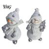 Winter Atmosphere Table Decor 2Pcs Christmas Snowman Figurine, Cute Tabletop Decor, Resin Snow Statue with Gift for Friends Knit Hat Scarf Home Mantel