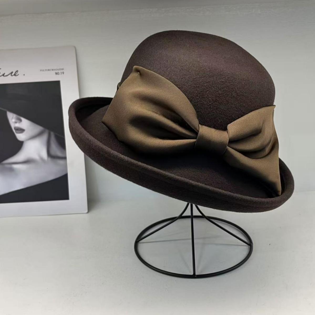 

High-end atmospheric Hepburn style Australian woolen bow basin hat fisherman hat children s autumn and winter French crimping top hat One size fits all, adjustable темно-коричневого