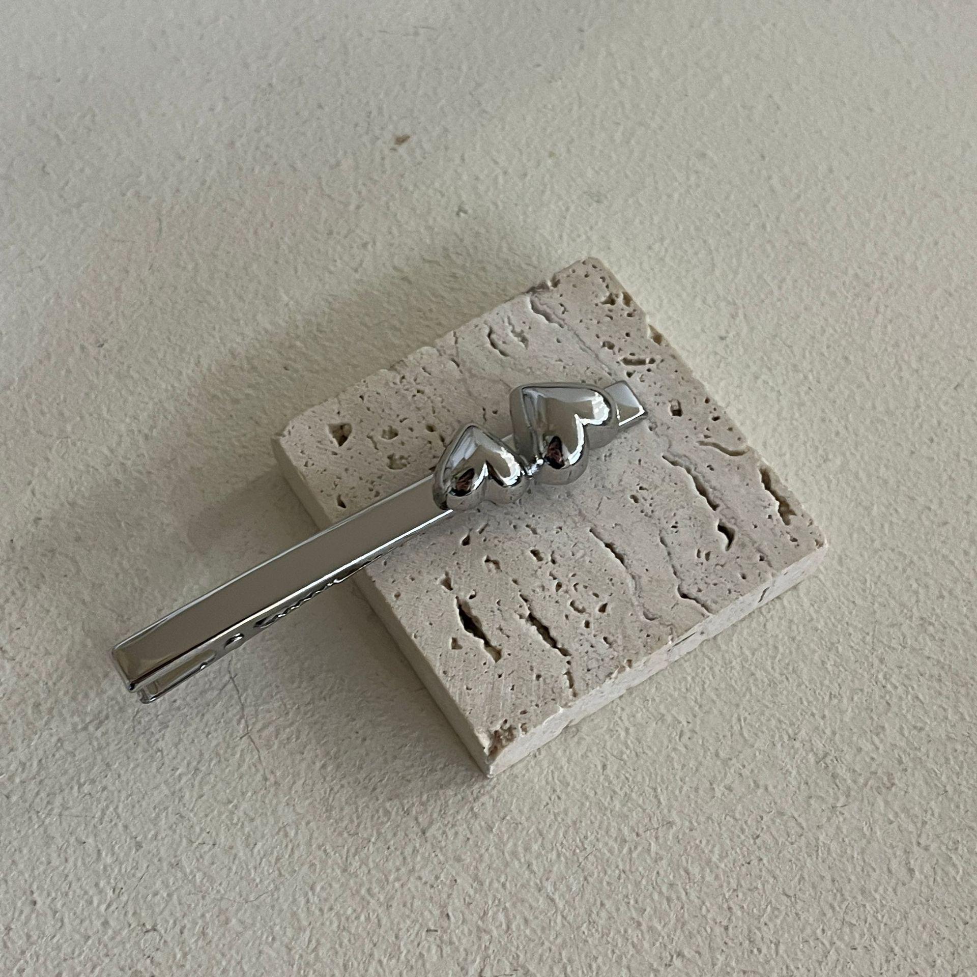 

Серебристая заколка-уточка для волос - Элегантный модный аксессуар