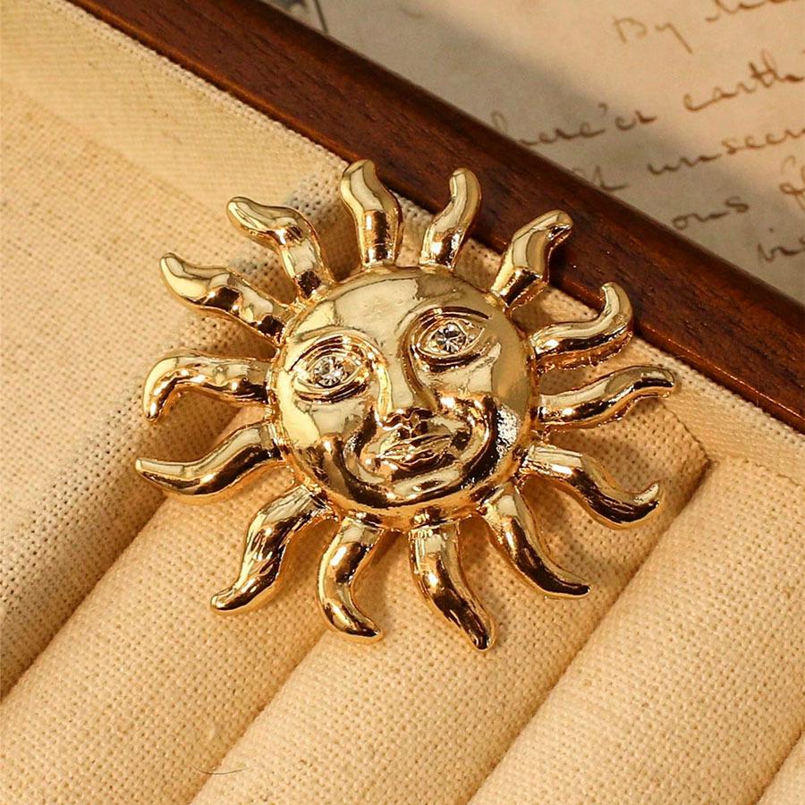 Europäische Exotische Sonnenbrosche: Goldlegierung Anstecknadel im Vintage-Stil