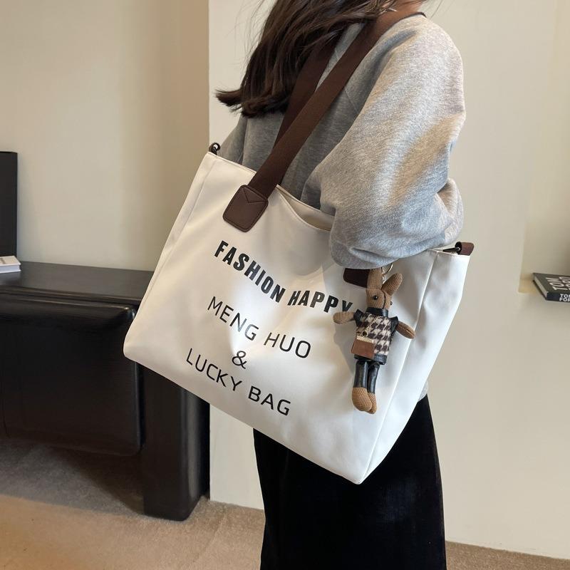 Canvas bag Women's oneshoulder literary and artistic largecapacity student tote bag Class versatile makeup bag Crossbody backpack