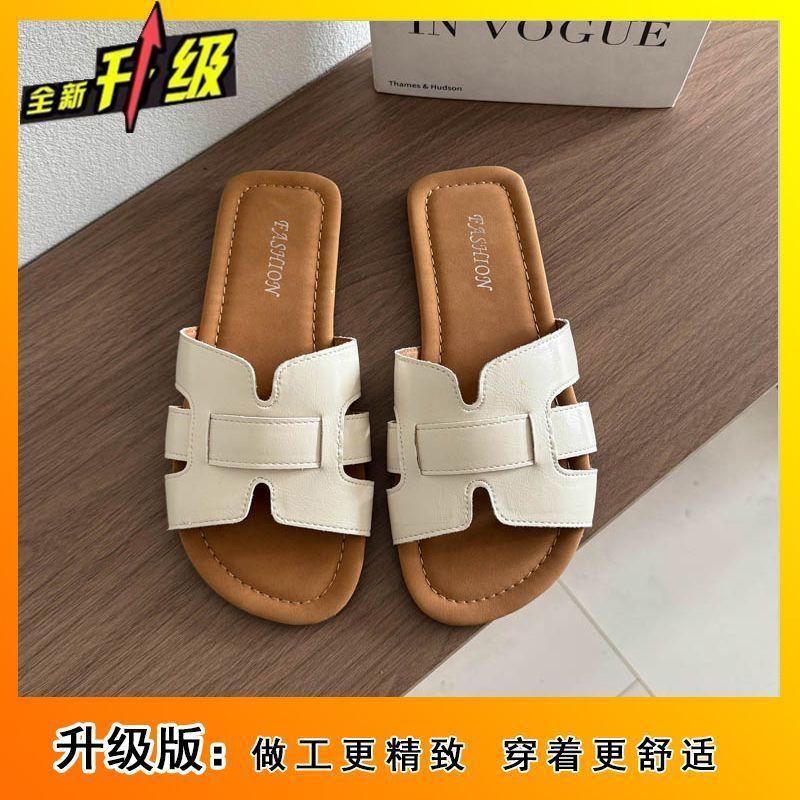 2025 new super hot one-word slippers women's summer wear fashion versatile skirt flat-bottomed beach cool slippers