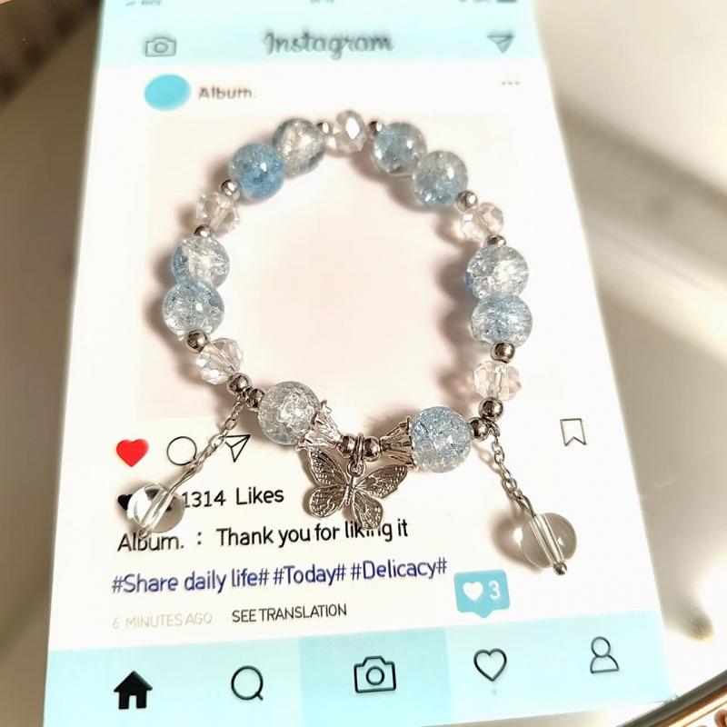 Weihnachts-Charm-Armband mit Crackle-Perlen, Schneeflocken-, Baum-, Weihnachtsmann- und Glockenanhängern
