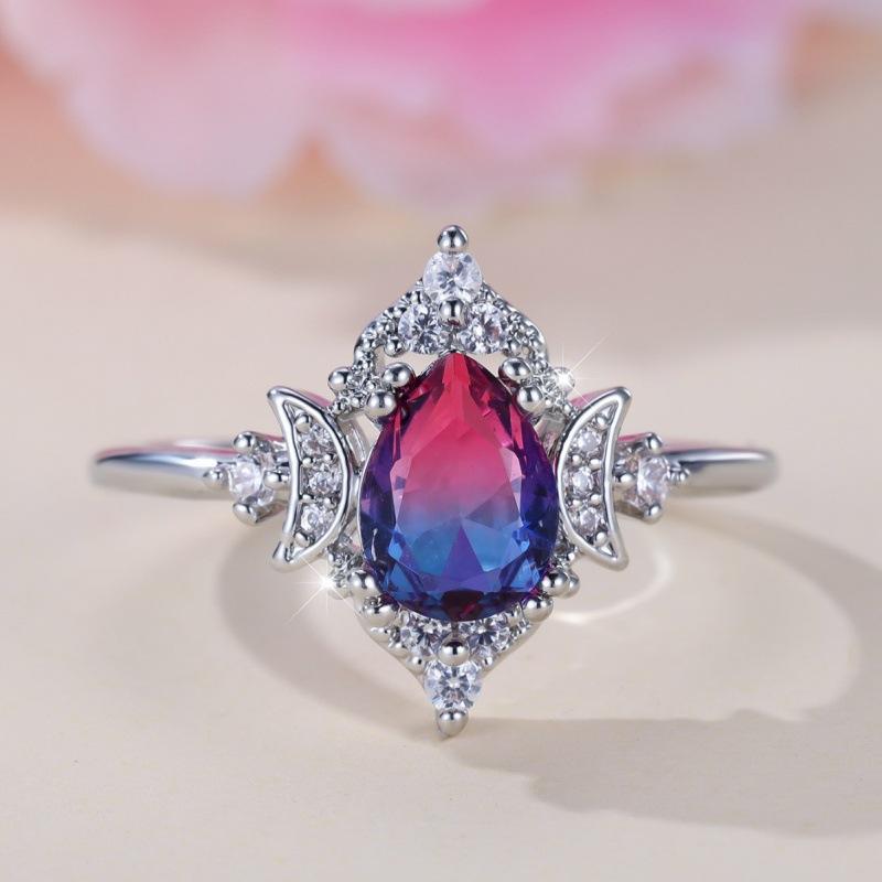 Hot-selling new models gradually change the personality of white K rose blue water drop tourmaline crown ring