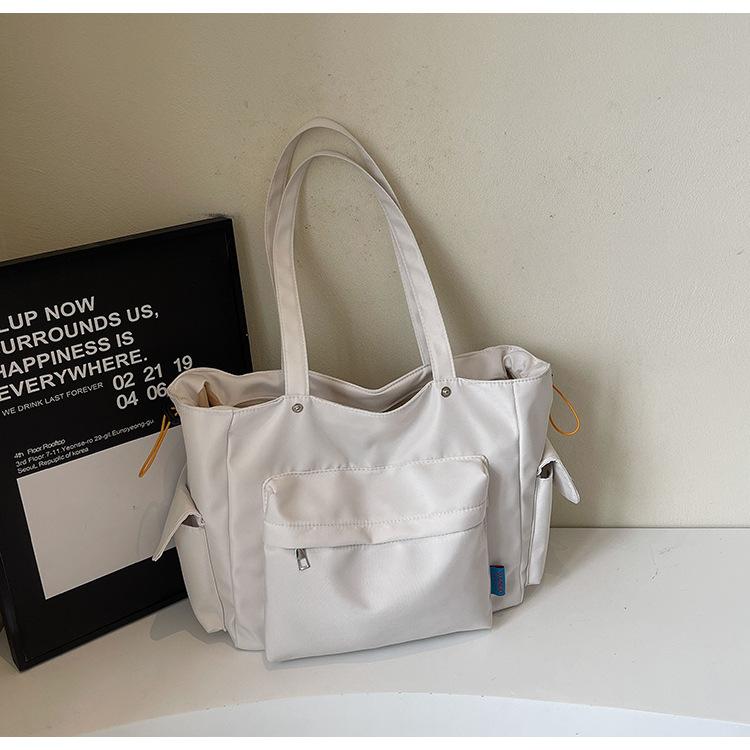 

Трендовая новая тканевая сумка большой вместимости женская 2025 весенняя сумка для поездок на работу сумка-тоут через плечо студенческая школьная сумка