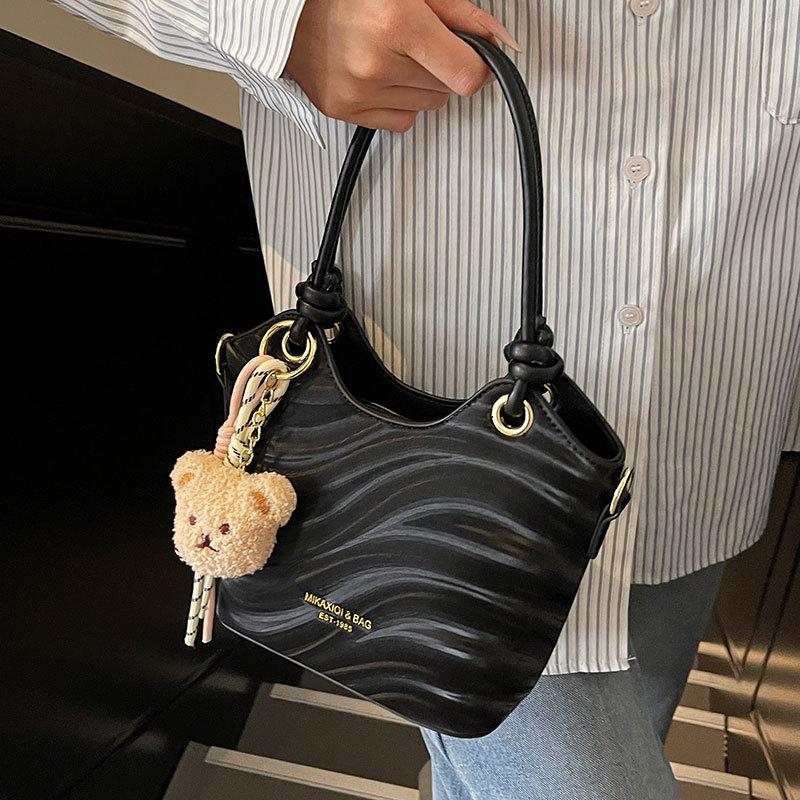 Wholesale New Product Premium Wave Pattern Simple Portable Bucket Bag Women's Leisure Work Commuter Versatile Messenger Bag